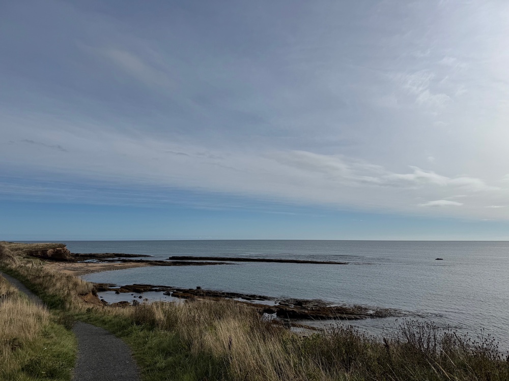 Officers were called by HM Coastguard at about 21:15 BST on Tuesday, following reports of a man being in the water near Boulmer, Northumberland (Helen Wilson-Beevers)