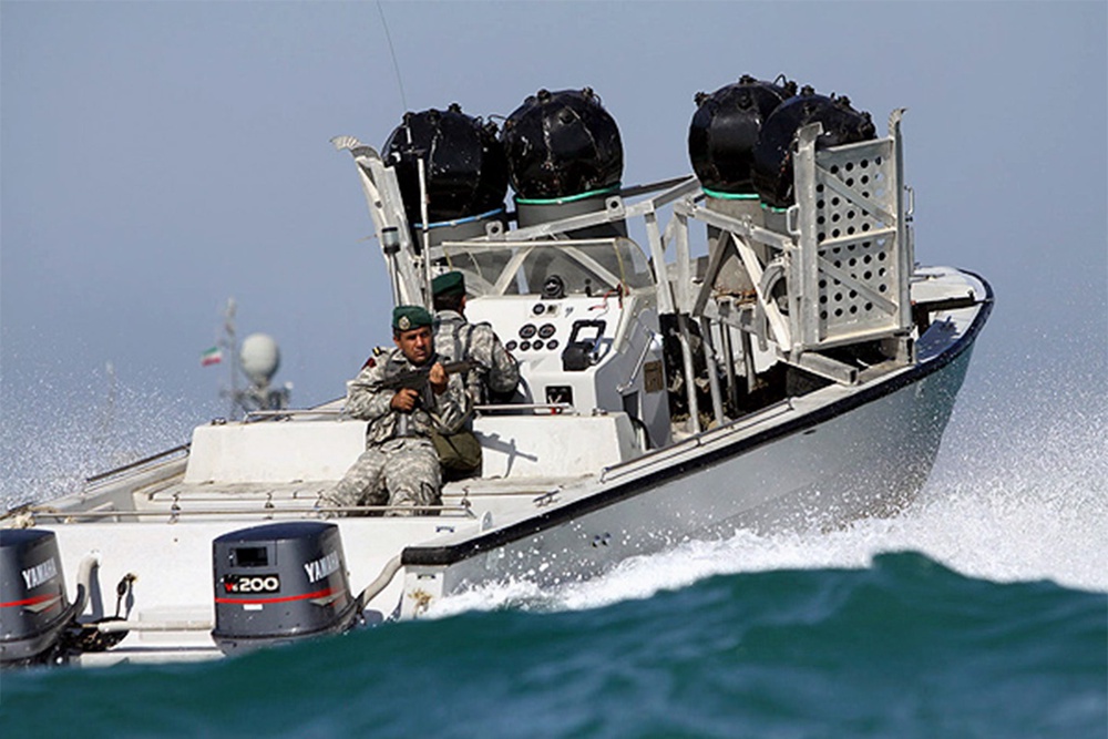 Iranian frogmen with what appeasr to be Maham sea mines on the bow of a boat (Iran state media)