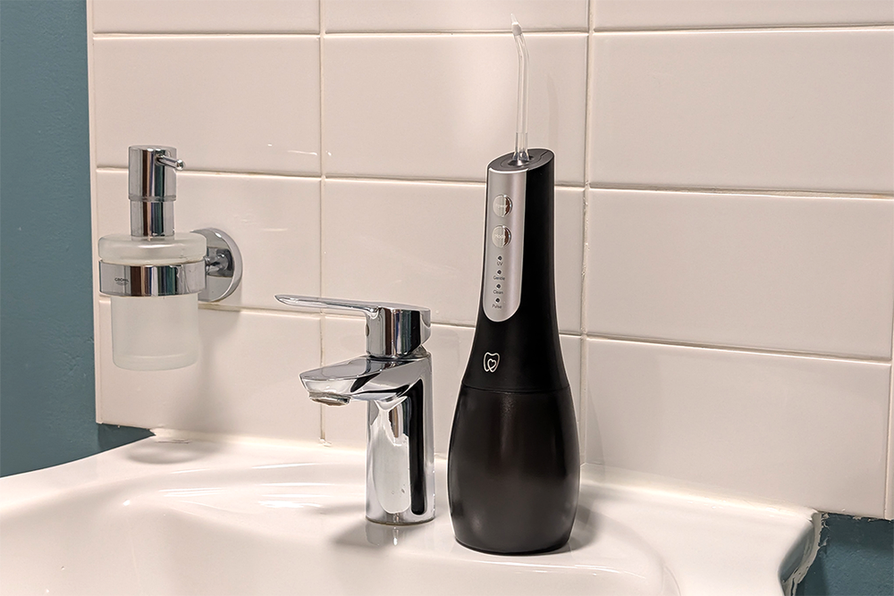 It features a UV-C LED light that sterilises water in the tank between uses (Steve Hogarty/The Independent)