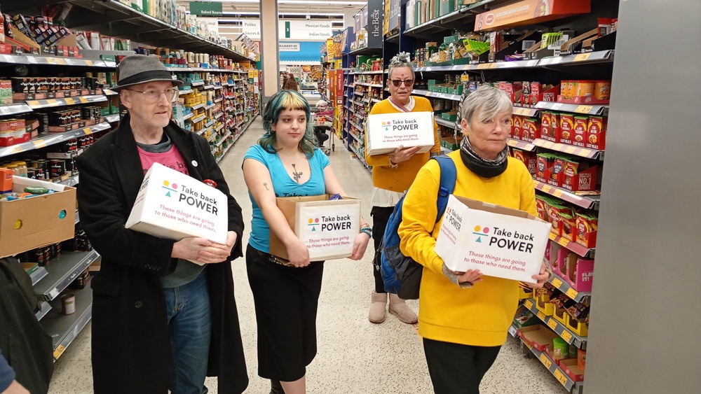 Activists took part in the campaign to ‘liberate’ boxes of food in several locations (PA)