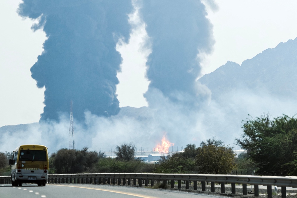 Smoke and flames rise from an energy installation in the Gulf emirate of Fujairah in March (AFP via Getty Images)