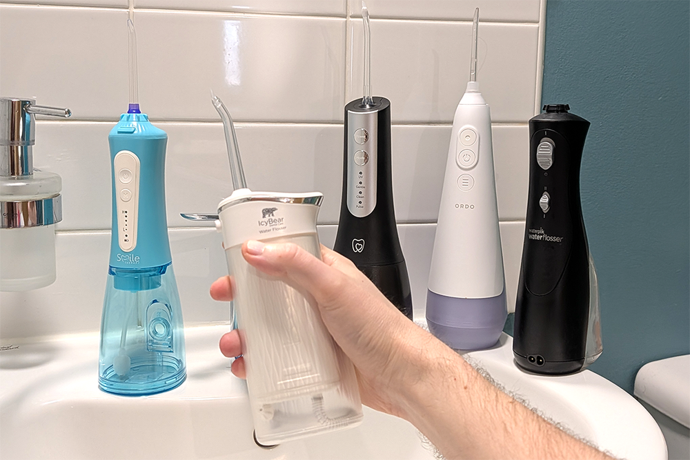 I swapped dental floss for water flossers over a period of weeks (Steve Hogarty/The Independent)