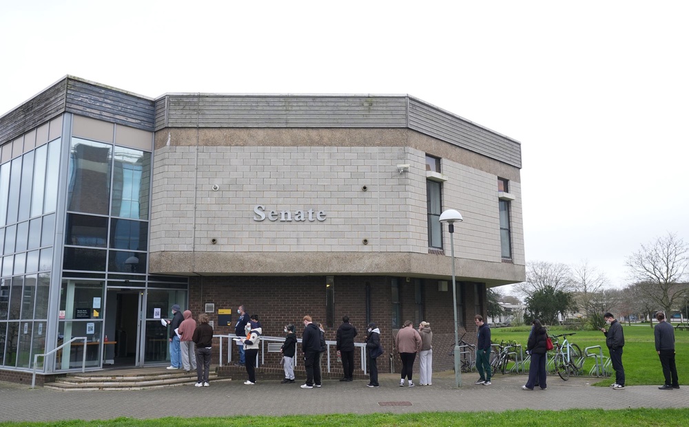 Students queuing to receive antibiotics (PA)