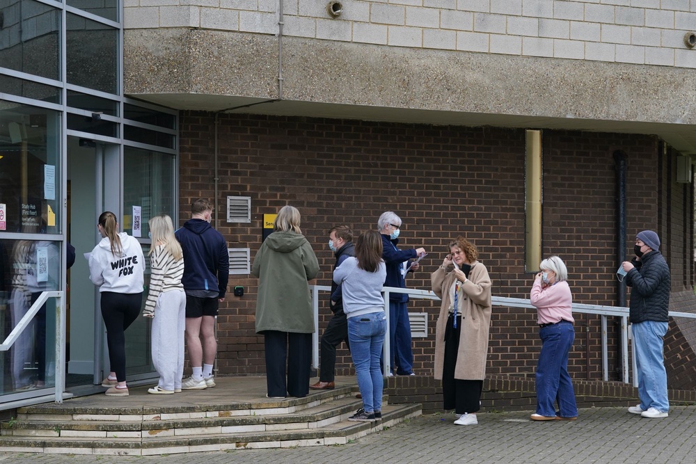 Students queuing to receive antibiotics (PA)