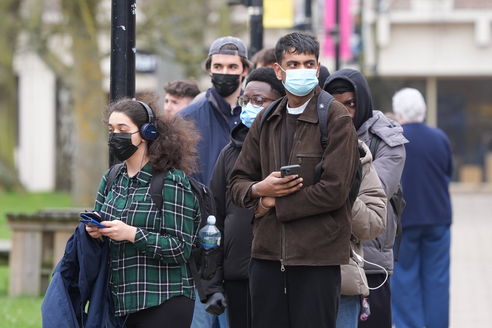 Students queuing for antibiotics outside a building at the University of Kent (Gareth Fuller/PA) (PA Wire)