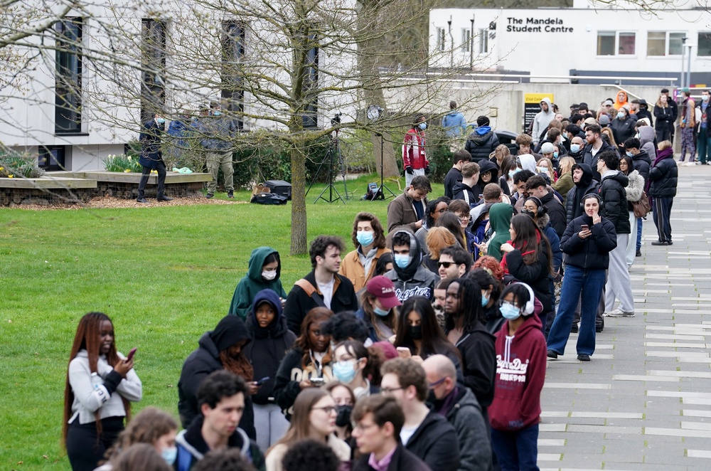 Students queuing for antibiotics (Gareth Fuller/PA Wire)