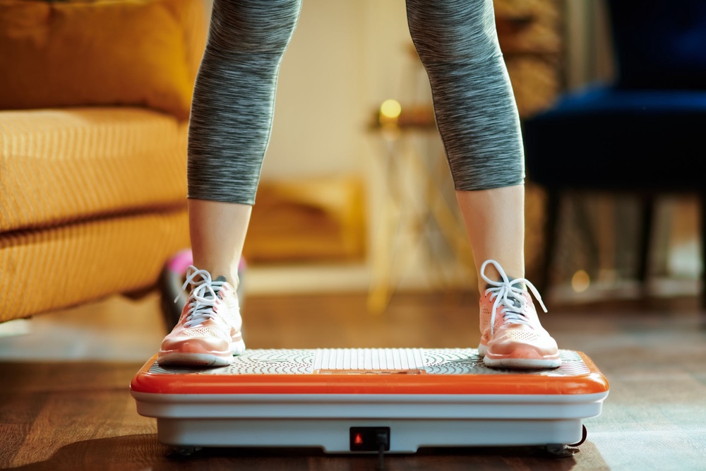 I imagine this might be what surfing feels like? The vibration plate involves balancing and flexing simultaneously while trying to stay on your board (Getty/iStock)