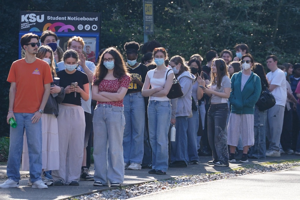 Students queuing to receive vaccines and antibiotics at the University of Kent campus in Canterbury back in March (PA)