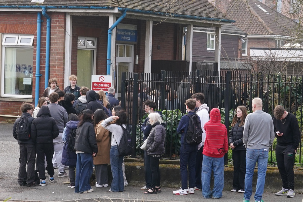 In March, students in Canterbury, Kent, queued to receive doses of the jab as the disease spread (PA)