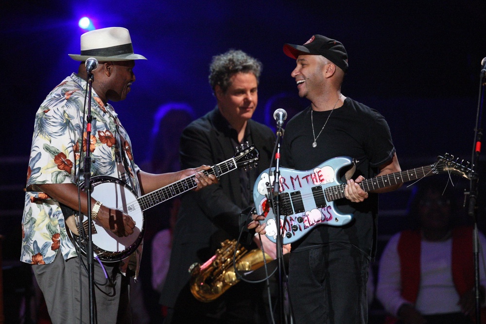 Taj Mahal, pictured with Rage Against The Machine’s Tom Morello at Pete Seeger’s 90th birthday celebration, says he almost became a farmer: ‘Music came and got me!’ (Getty)