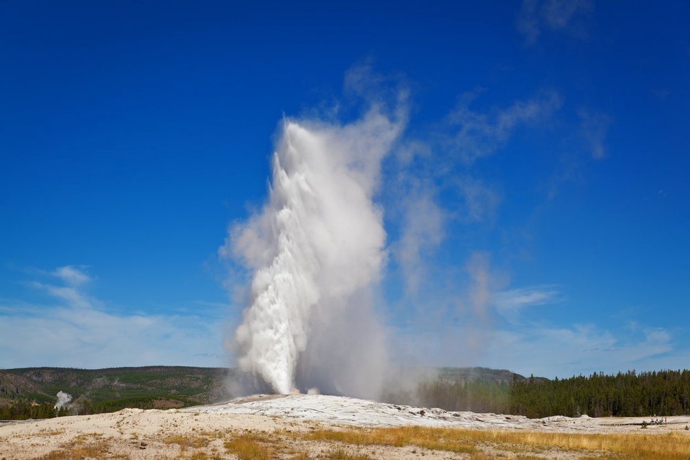 Old Faithful, which shoots hot water around 180 feet into the air, is one of around 500-700 geysers in Yellowstone National Park (Getty Images/iStockphoto)