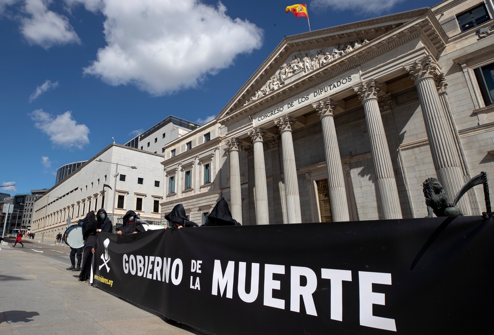 Anti-euthanasia campaigners outside Spanish parliament in Madrid in 2021 (AP)
