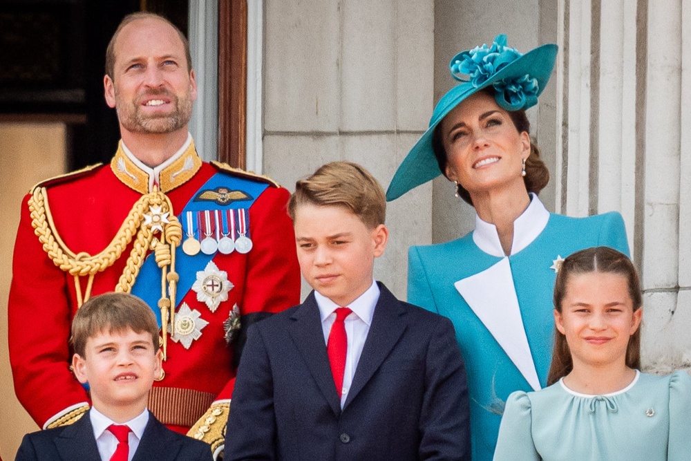 Not like us: William’s family, in a particularly relatable scene, on the balcony of Buckingham Palace (PA)