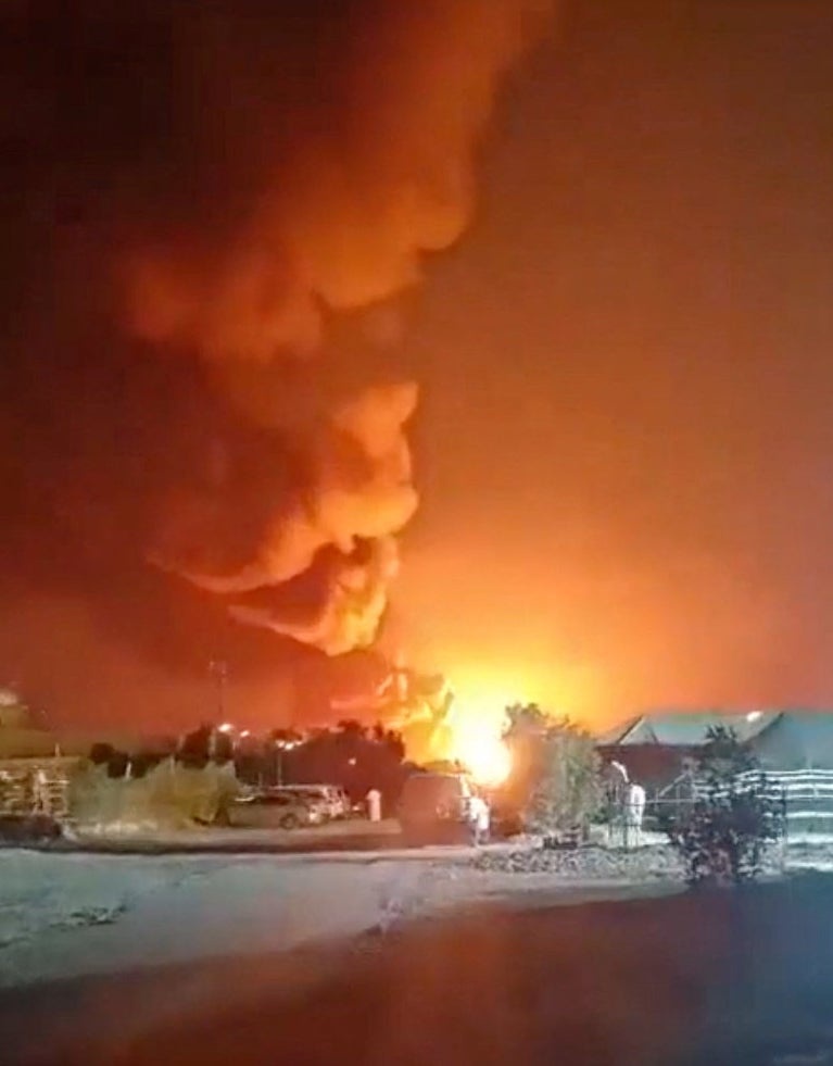 Smoke rises from an explosion in the direction of Ali Al Salem Air Base, amid the U.S.-Israeli conflict with Iran, in Al Jahra on 27 March. (Social media)