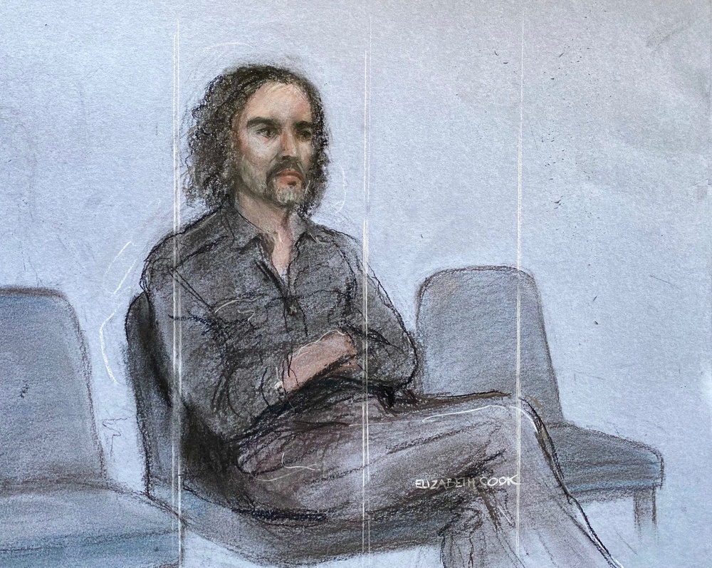 A court artist drawing of Russell Brand appearing at Westminster Magistrates’ Court in May (PA Archive)