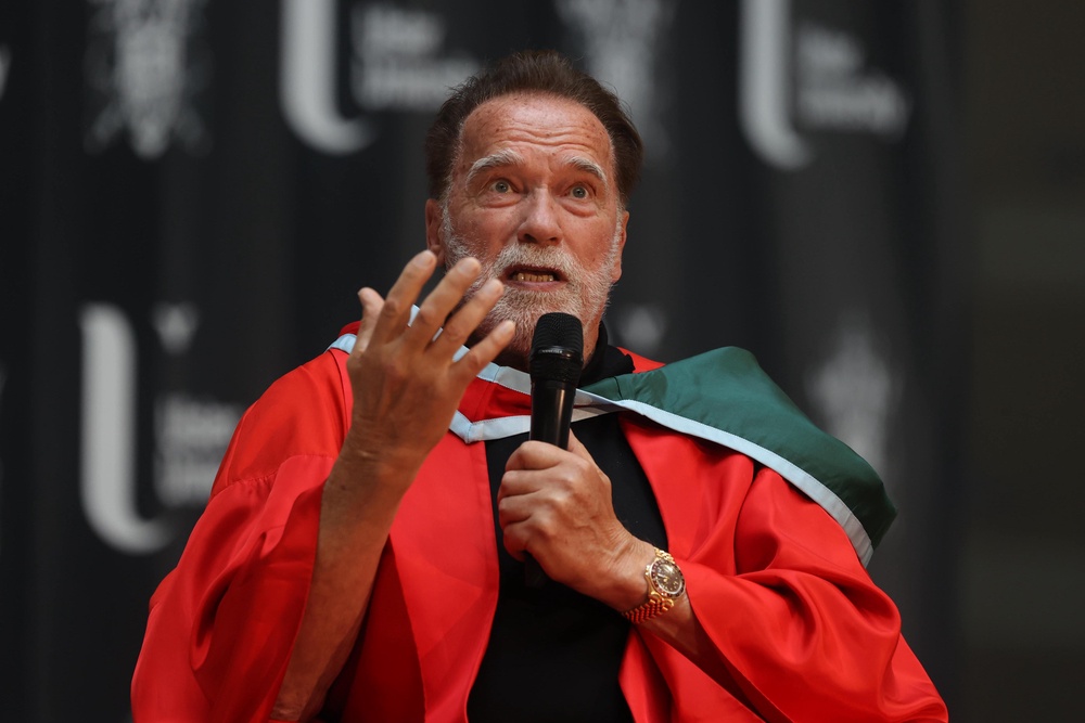 Arnold Schwarzenegger answers questions after receiving his honorary doctorate presented to him by the Ulster University in Belfast (Liam mcBurney/PA) (PA Wire)