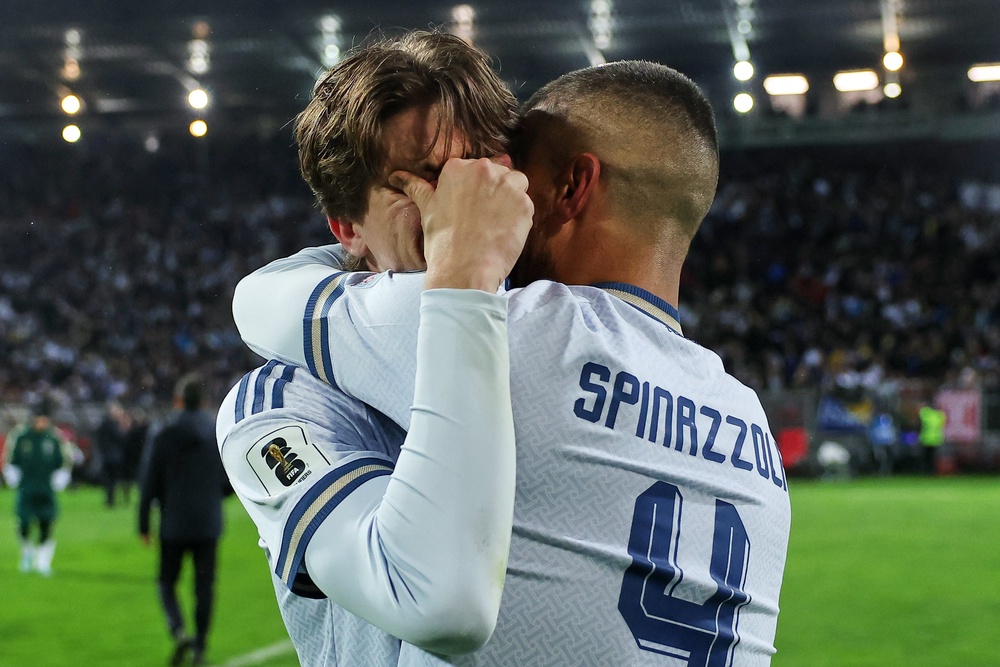Distraught Italian players react to being knocked out of World Cup qualifying by Bosnia-Herzegovina (AP)