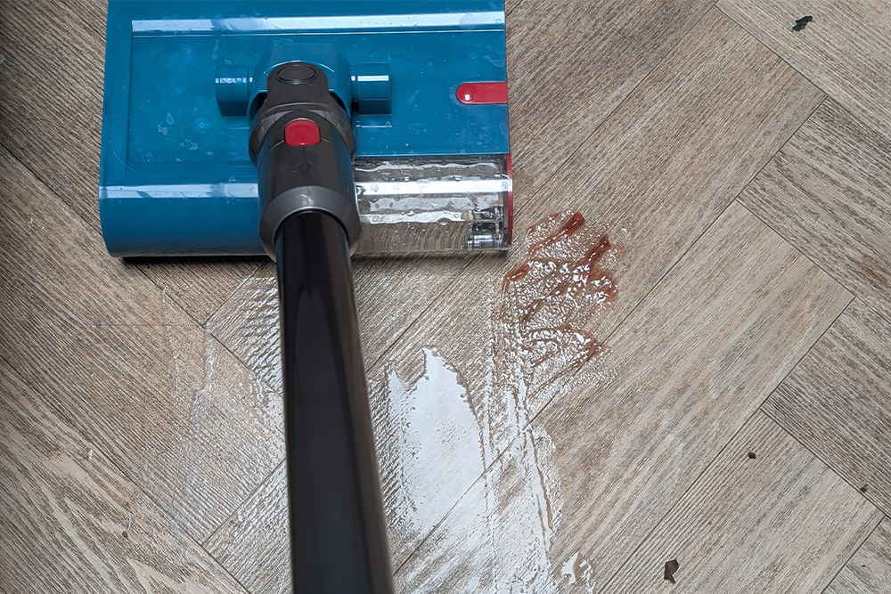 It vacuums and washes hard floors simultaneously (Joanne Lewsley/The Independent)