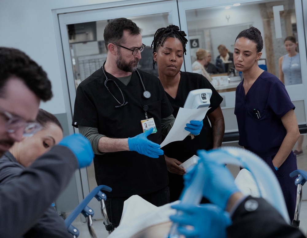 Ayesha Harris (middle), who stars as senior night shift resident Dr. Parker Ellis, has been promoted to a series regular for season three (Warrick Page/MAX)