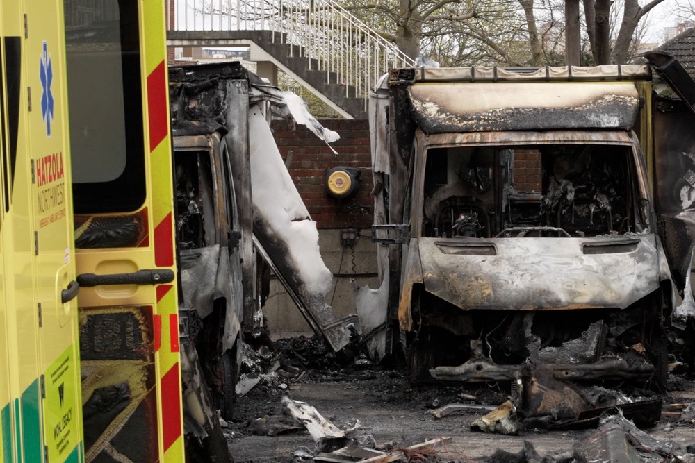The burnt-out remains of Hatzola ambulances in Golders Green (PA Wire)