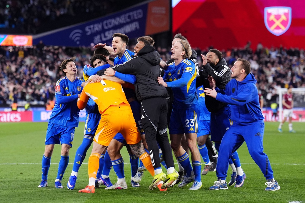 Leeds celebrate their penalty shootout win (John Walton/PA). (PA Wire)