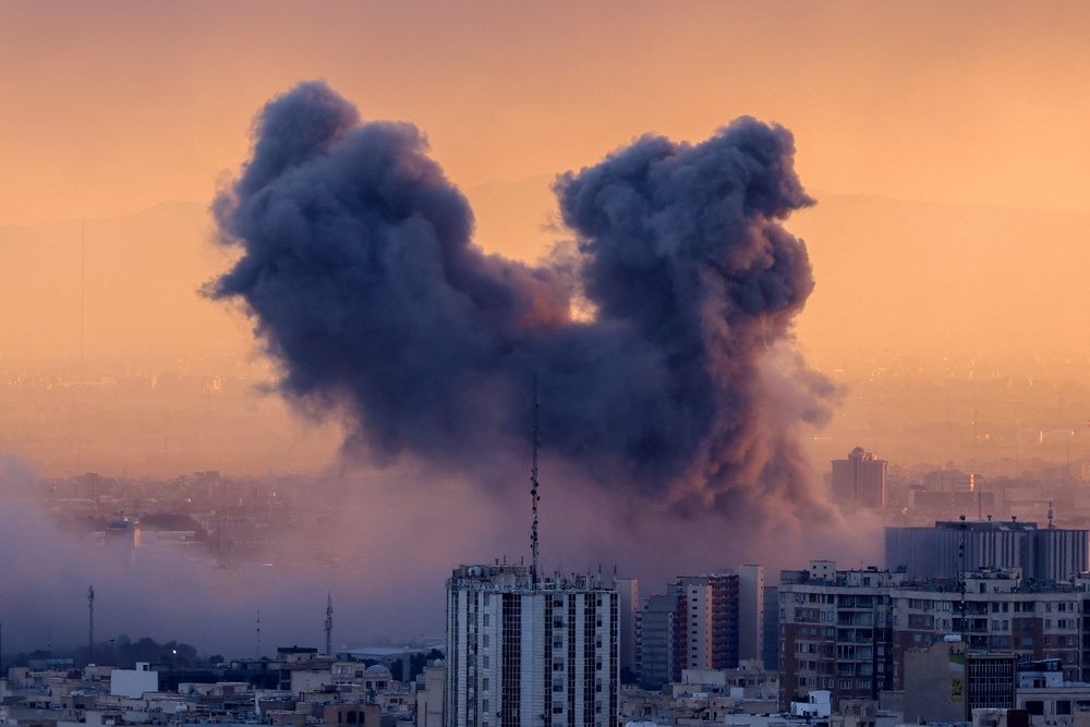 A plume of smoke rises after a strike on the Iranian capital Tehran, on March 3, 2026 (AFP/Getty)