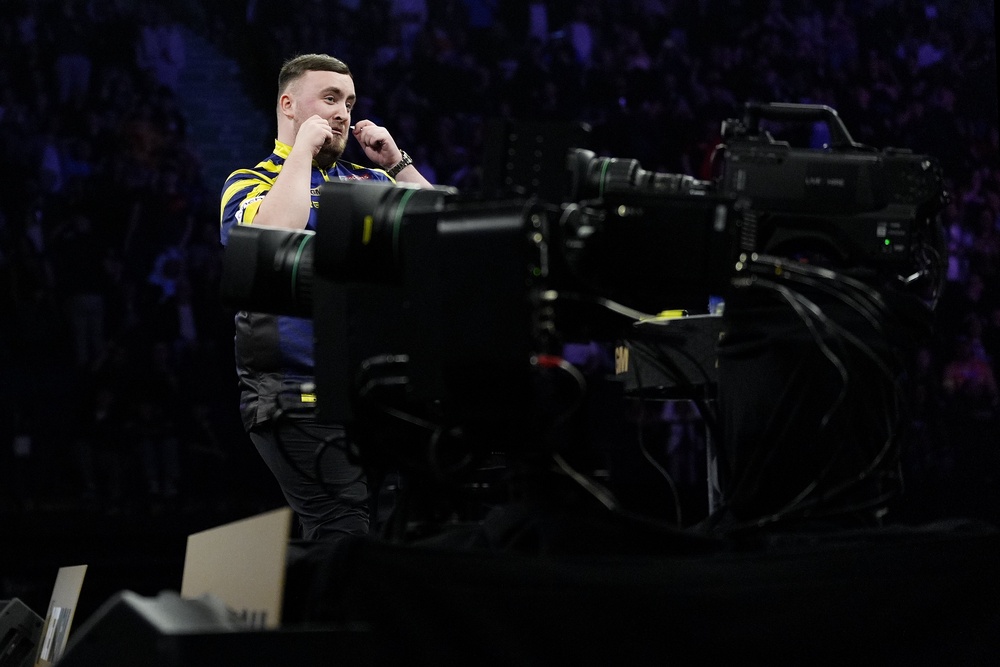 Littler made a ‘cry baby’ gesture in a bad-tempered end to his clash with Van Veen in Manchester (Peter Byrne/PA) (PA Wire)