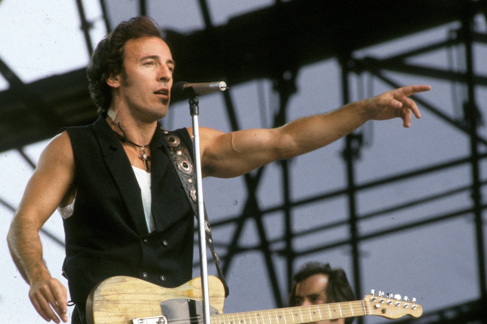 In July 1988, Springsteen played to some 300,000 East Germans thirsting for freedom, a spectacle some argue may have had a hand in the Berlin Wall falling a year later (DPA/AFP via Getty Images)