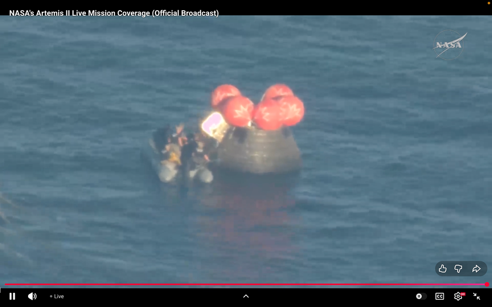 U.S. Navy personnel enter the Artemis II crew capsule after it splashed down near San Diego on Friday April 10, 2026. (NASA via YouTube)