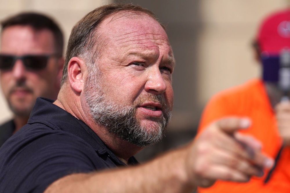 InfoWars founder Alex Jones also responded to Trump's criticism, saying he hopes the president is 'free him from the demonic influences that he’s under' (Getty Images)