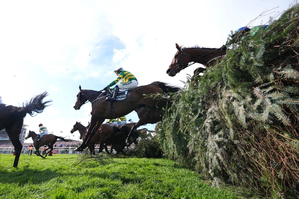 I Am Maximus, ridden by Paul Townend (centre), on their way to winning the Randox Grand National Handicap Chase (Mike Egerton/PA Wire)