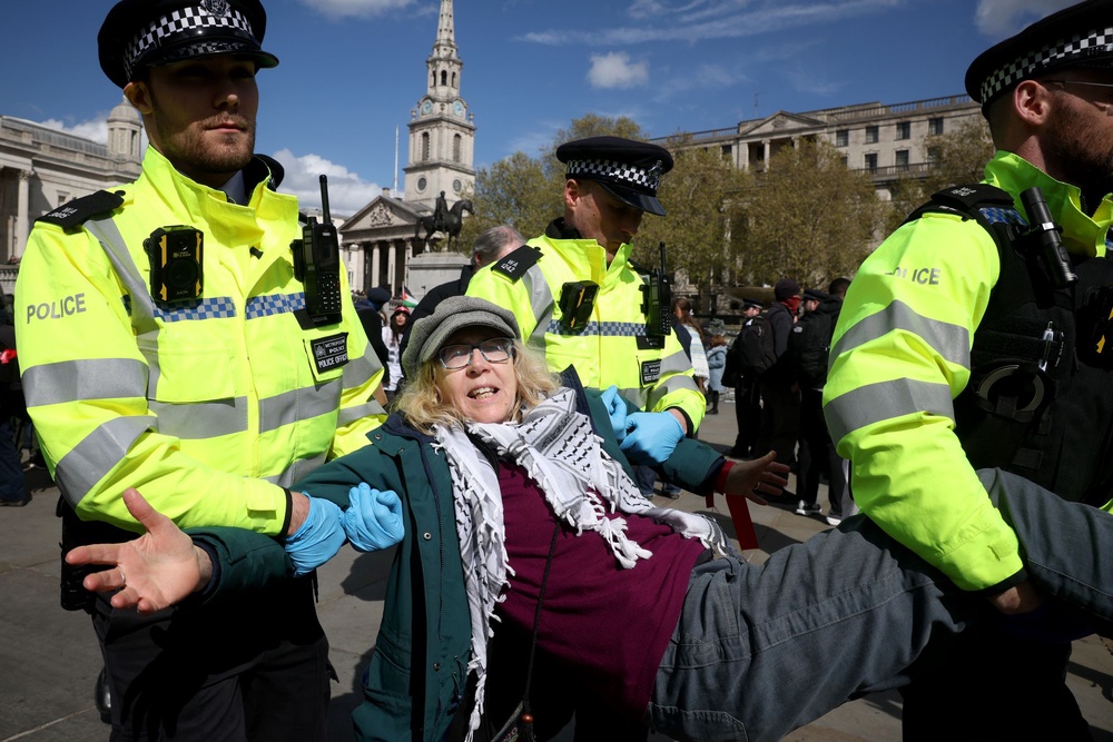 Police make arrests as demonstrators participate in 'Everyone Day', a mass action against the Government's proscription of Palestine Action, at Trafalgar Square (Getty)