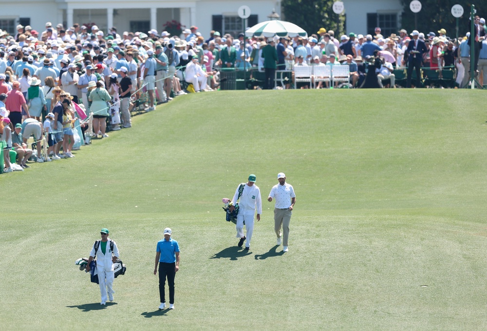 Ludvig Aberg of Sweden and Scottie Scheffler of the United States walk the first fairway (Getty Images)