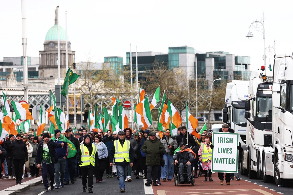Protesters make their way to O'Connell Street on Saturday during a fuel protest in Dublin, Ireland (AP)
