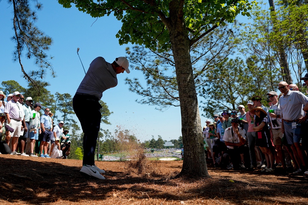 Rory McIlroy’s wayward driving cost him dearly in the third round of the Masters as he squandered a six-shot lead (Eric Gay/AP) (AP)