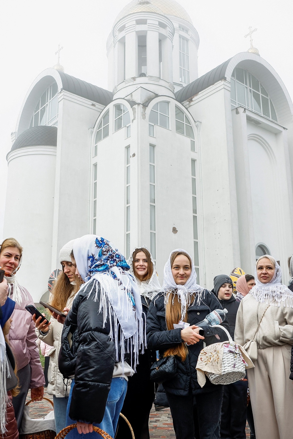 Orthodox Christians at St Andrew's Church in Bucha, Kyiv on Sunday 12 April 2026 (REUTERS)