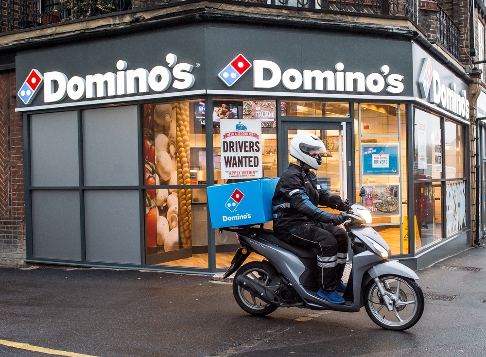 Pizzerias get specific benefits from using in-house drivers that third-party delivery services haven’t quite achieved. That means the traditional pizza driver likely isn’t going away for a while (PA Media)