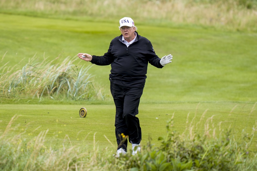 US President Donald Trump, pictured playing at his Trump Turnberry golf course, is a huge fan of the sport (Jane Barlow/PA) (PA Wire)