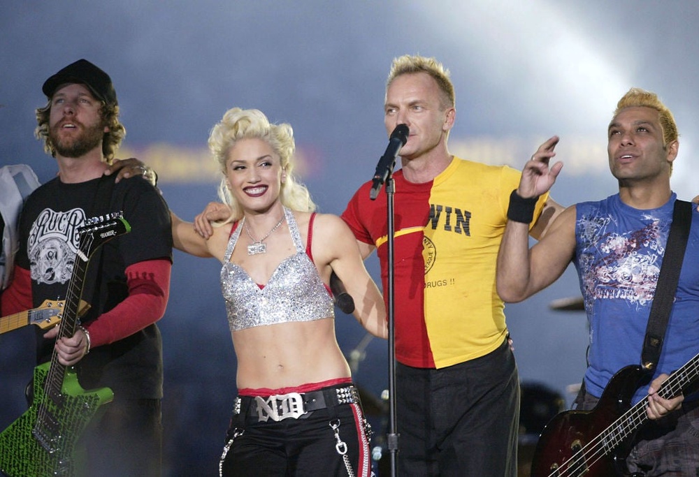 Dumont (far left) on stage with No Doubt at the 2003 Super Bowl (Getty Images)