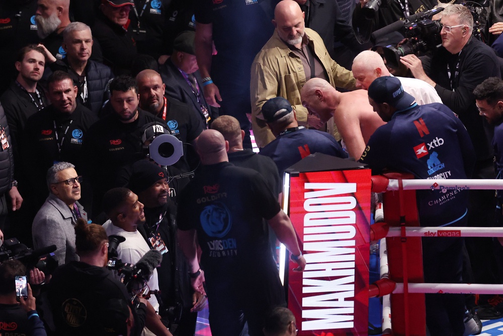 Tyson Fury and Anthony Joshua exchanging words after Fury beat Arslanbek Makhmudov (Getty)