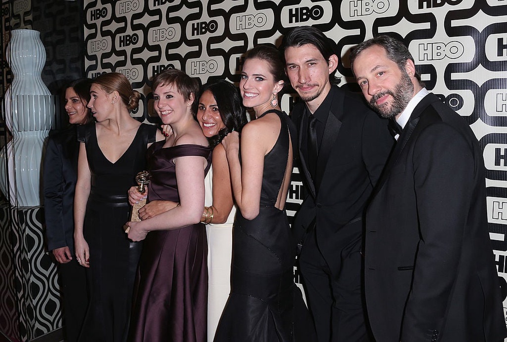 Dunham (third from left) and Driver (second from right) with the cast and creative team of 'Girls' in 2013 (Getty)