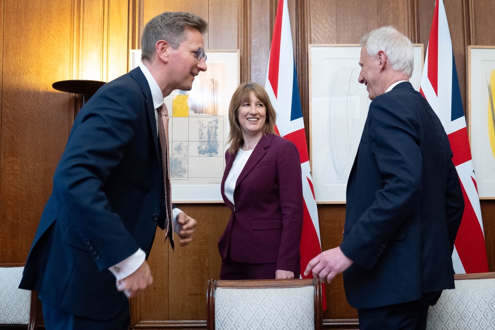 Chancellor Rachel Reeves with Oliver Holbourn, chief executive of the National Wealth Fund (left) and Chris Cholerton of Rolls-Royce SMR (right) (Stefan Rousseau/PA) (PA Wire)