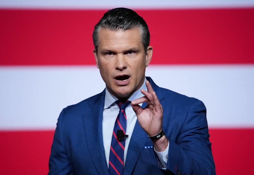 Defense Secretary Pete Hegseth hit out at 'dudes in dresses' in an address to senior military officers at Marine Corps Base Quantico in Virginia last September (AFP/Getty)