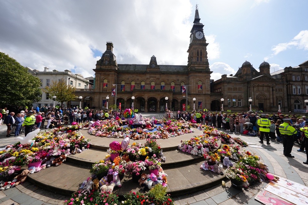 Flowers and tributes in Southport, August 2024 (PA)