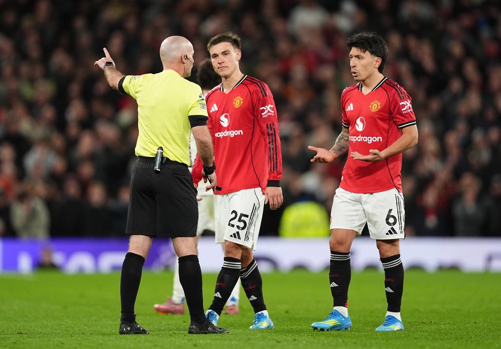 Lisandro Martinez, right, was bemused by his dismissal (Martin Rickett/PA) (PA Wire)