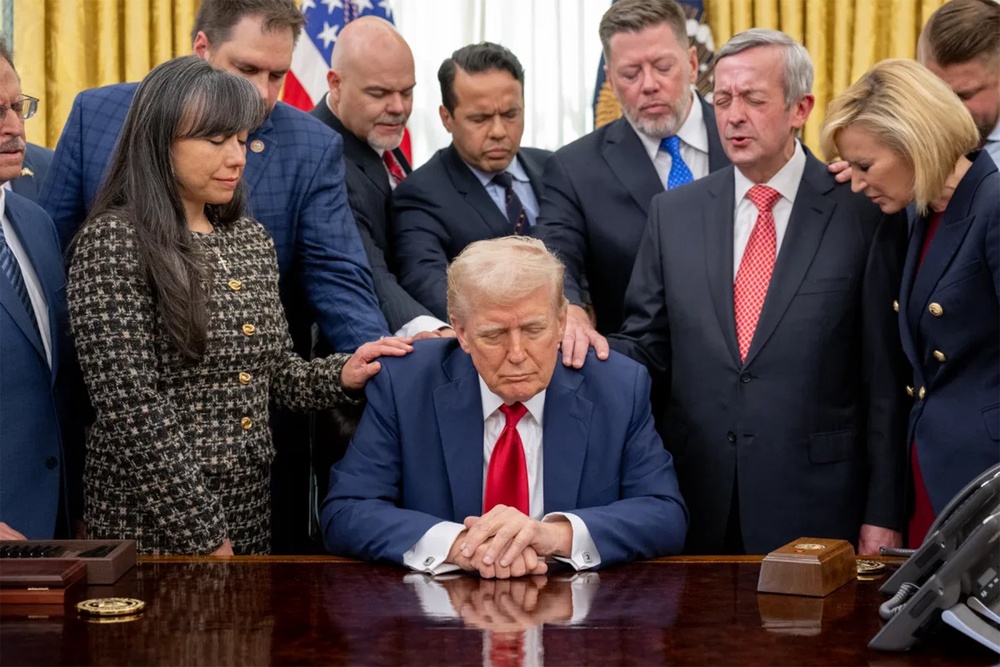 Donald Trump joins faith leaders in prayer on 13 April (The White House)