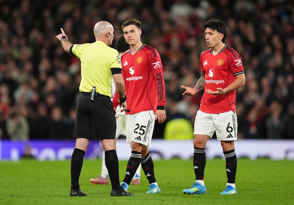 Lisandro Martinez, right, was bemused by his dismissal (Martin Rickett/PA) (PA Wire)