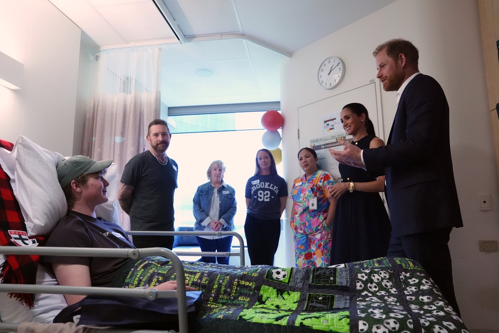 The Duke and Duchess of Sussex meet patient Hamish and family members on the Adolescent Oncology and Rehabilitation ward during a visit to the Royal Children’s Hospital Melbourne (Jonathan Brady/PA) (PA Wire)