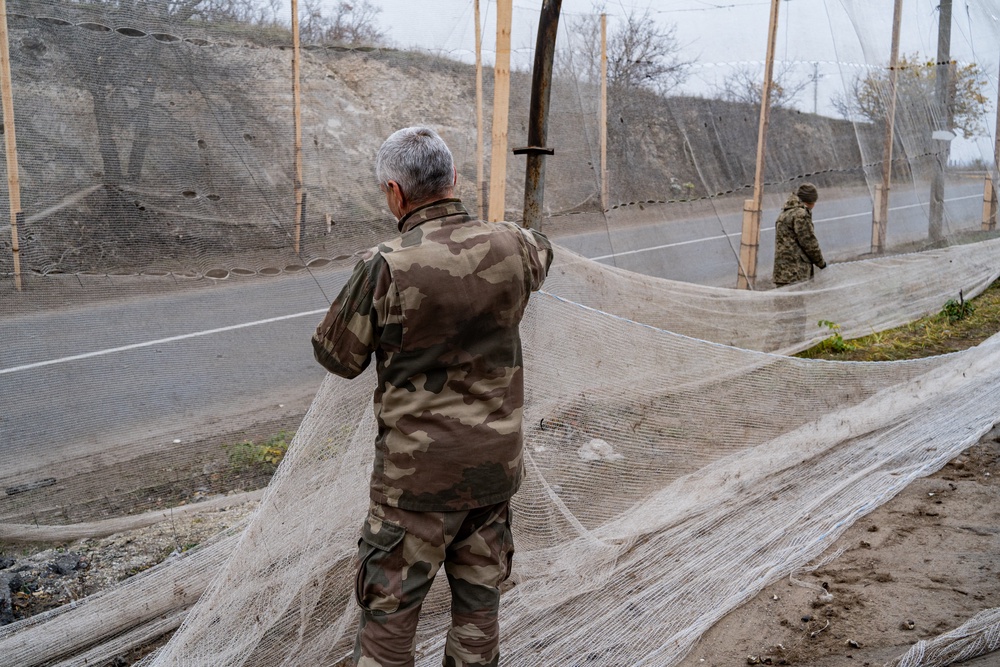 Ukrainian soldiers covering the roads with fishing as a protection from FPV drones attacs in the region of Sumy in the east of Ukraine (AFP/Getty)