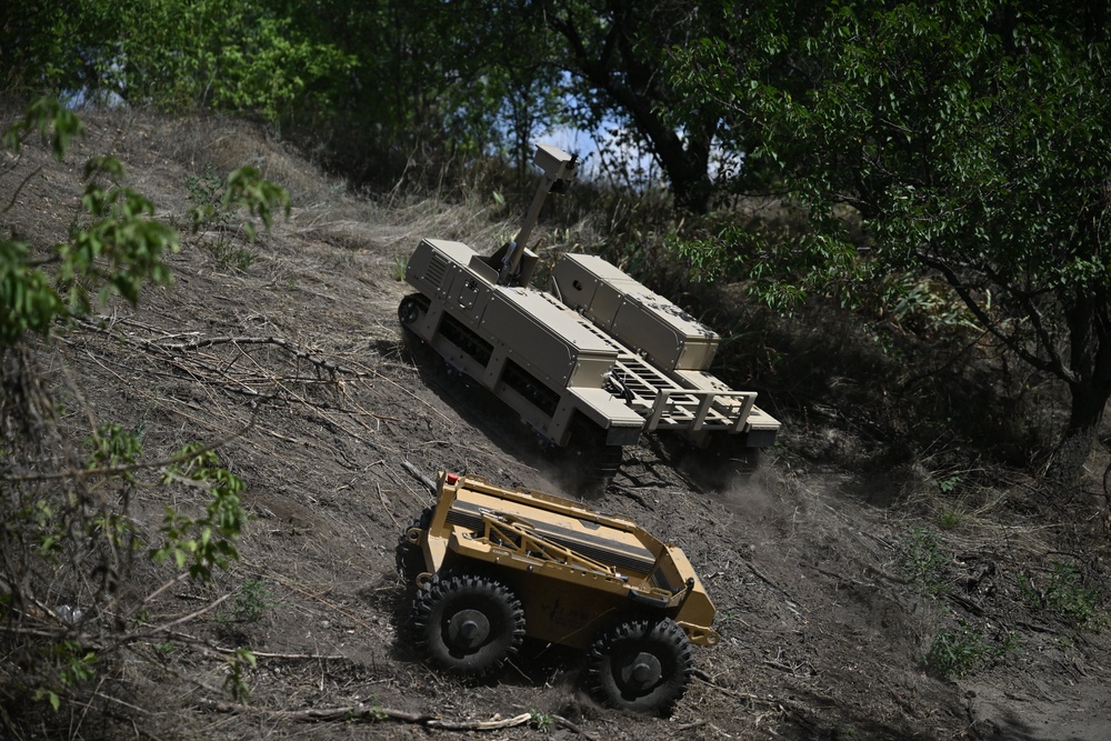 Drones and non-armed military robotics are in heavy use in the Ukraine war, as is pictured here, serving roles ranging from bomb disposal to evacuating wounded troops, and experts urge the international community to establish guardrails around these new technologies as they continue to proliferate (AFP/Getty)